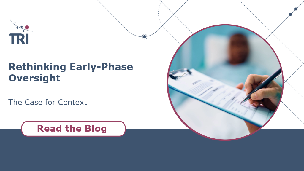 Graphic with the TRI logo and the headline ‘Rethinking Early-Phase Oversight – The Case for Context.’ A circular photo shows a close-up of a hand writing on a medical form on a clipboard, with a patient lying in a hospital bed in the blurred background. A red button below reads ‘Read the Blog'.