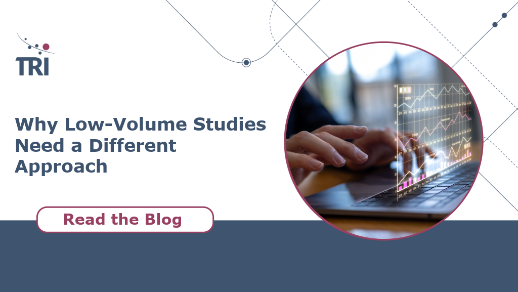 Promotional graphic for a blog on low-volume studies, featuring the headline "Why Low-Volume Studies Need a Different Approach", a call-to-action button reading "Read the Blog", and an image of a laptop displaying clinical data and trend charts to represent study oversight and monitoring.