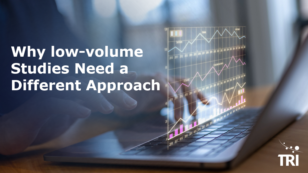 Laptop displaying analytics charts beside the headline, “Why low-volume Studies Need a Different Approach,” with TRI branding.